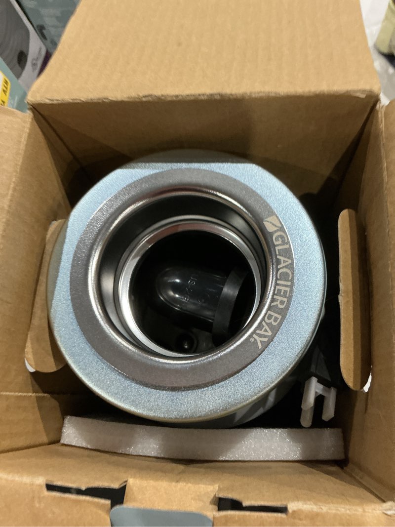 Condition photo showing As Is for turbogrind 1/2 hp. continuous feed garbage disposal with power cord