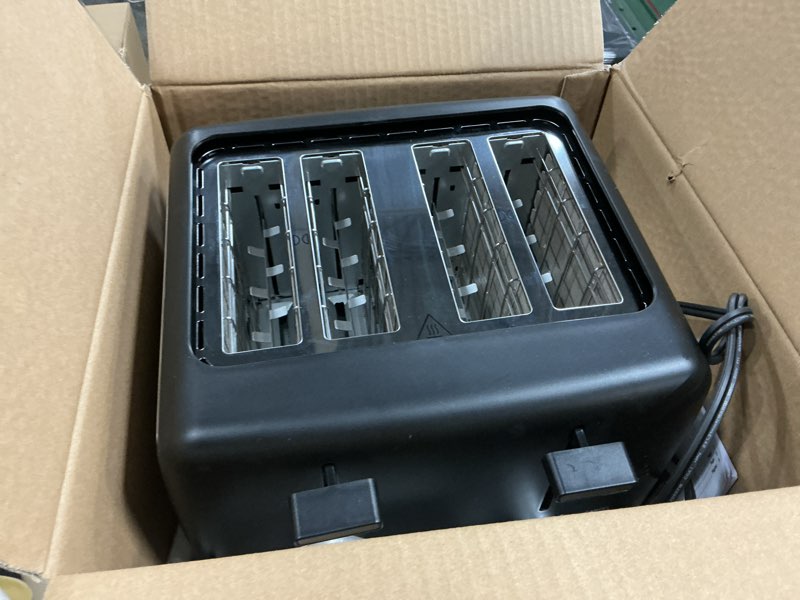 Condition photo showing Good Condition for Amazon Basics 4 Slice Toaster, With 7 Browning Settings, Extra Wide Slots For Bagels and Special Breads, Removable Easy-to-Clean Crumb Trays, Cancel/Defrost/Bagel Buttons, 1500W, Black & Silver 4 Slice Matte Black Front