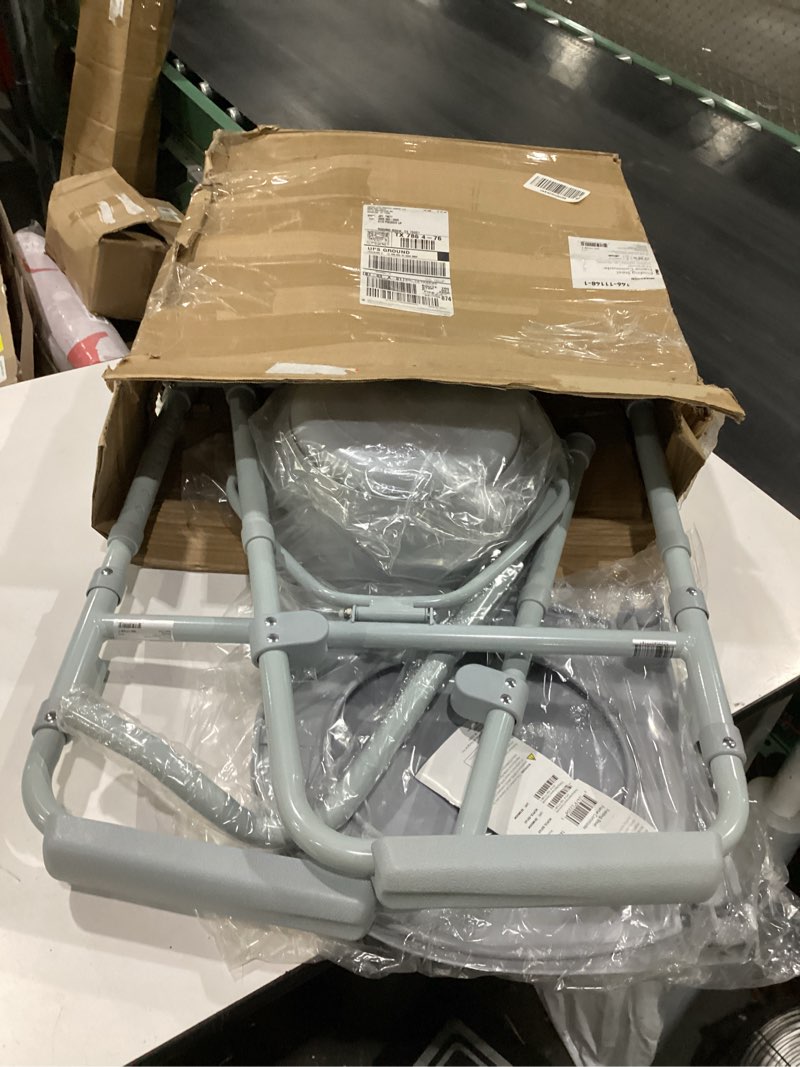 Condition photo showing New/Like New for mckesson folding commode chair with 7.5 qt bucket, 350 lbs weight capacity, 13 1/2 in seat width, adjustable height, 1 count