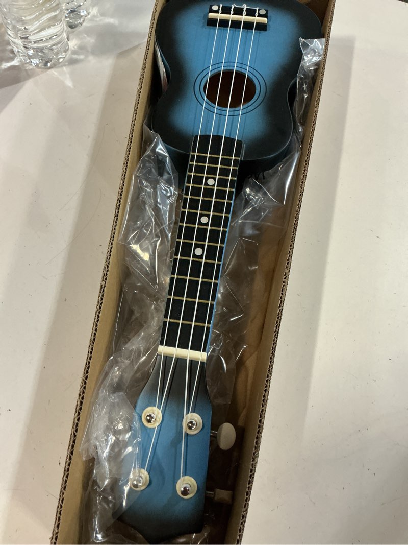 Condition photo showing New/Like New for 21 Inch 4 String Wooden Acoustic Guitar Ukulele Musical Instruments Perfect for Beginner (Blue)