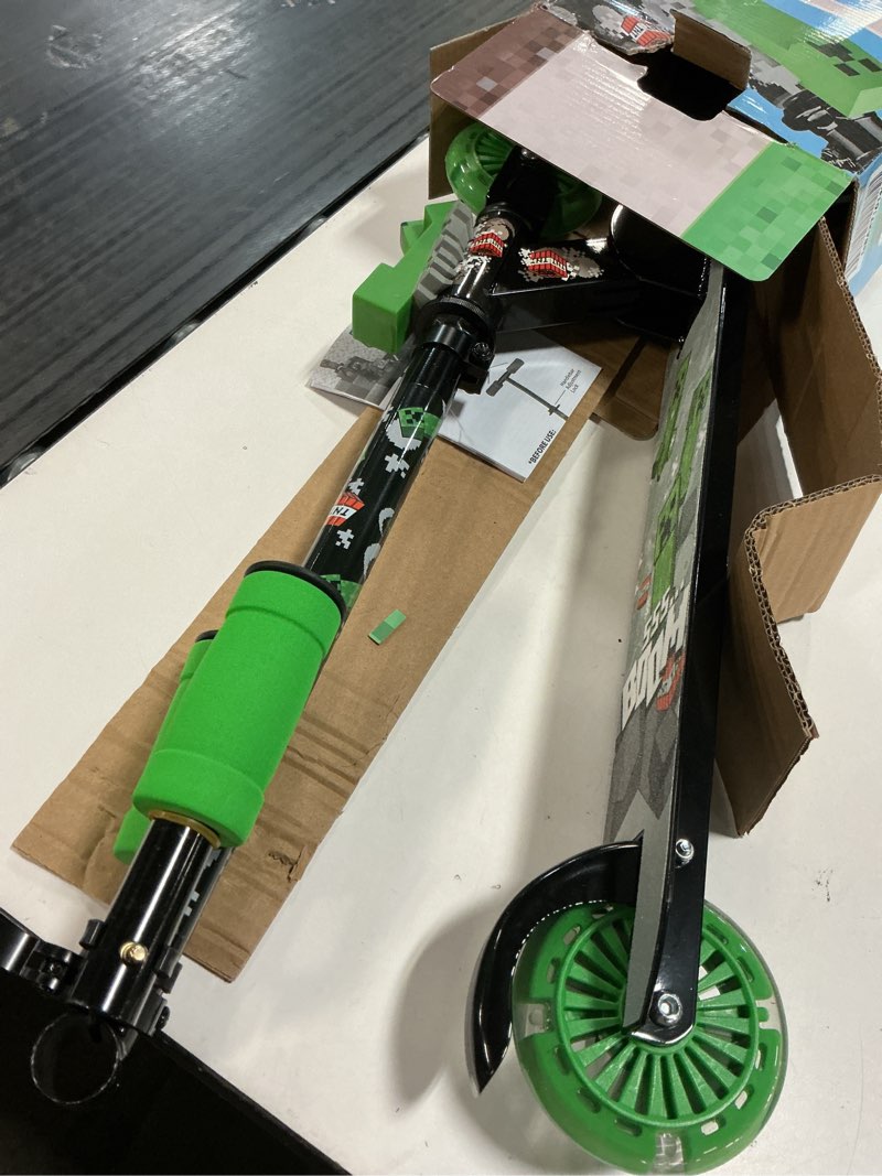Condition photo showing As Is for minecraft 2 wheel kick scooter with light up wheels – foldable, non-slip deck, comfortable & smooth ride