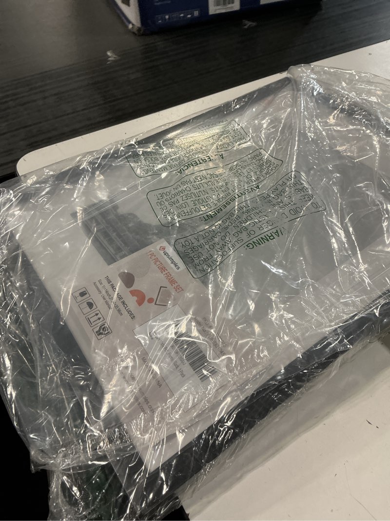 Condition photo showing Good Condition for upsimples 11x14 picture frame, display pictures 8x10 with mat or 11x14 without mat, wall hanging photo frame, black, 1 pack black 11x14