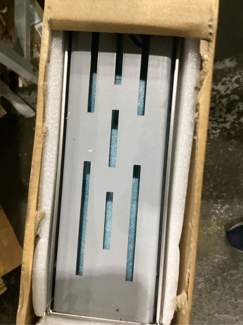 Condition photo showing Good Condition for neodrain 60 inch rectangular linear shower drain with brick pattern grate, brushed 304 stainless steel bathroom floor drain, shower linear drain &leveling feet, hair strainer, cupc certified stainless 60 in