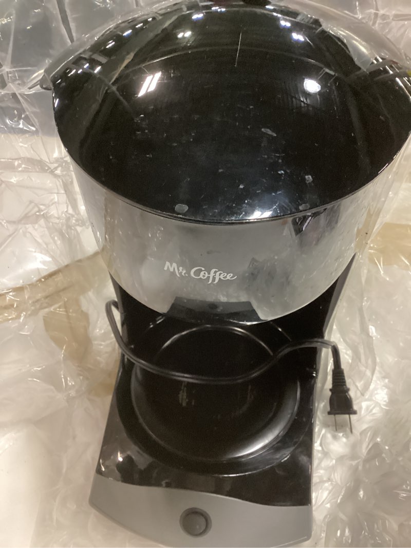 Condition photo showing As Is for mr. coffee black coffee maker, 12 cups, with auto pause and glass carafe, perfect for home and office use