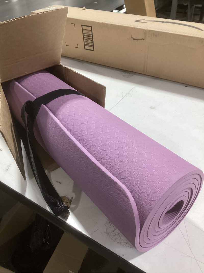 Condition photo showing Good Condition for Amazon Basics 1/4 Inch Thick TPE Exercise Yoga Mat with Carrying Strap Plum