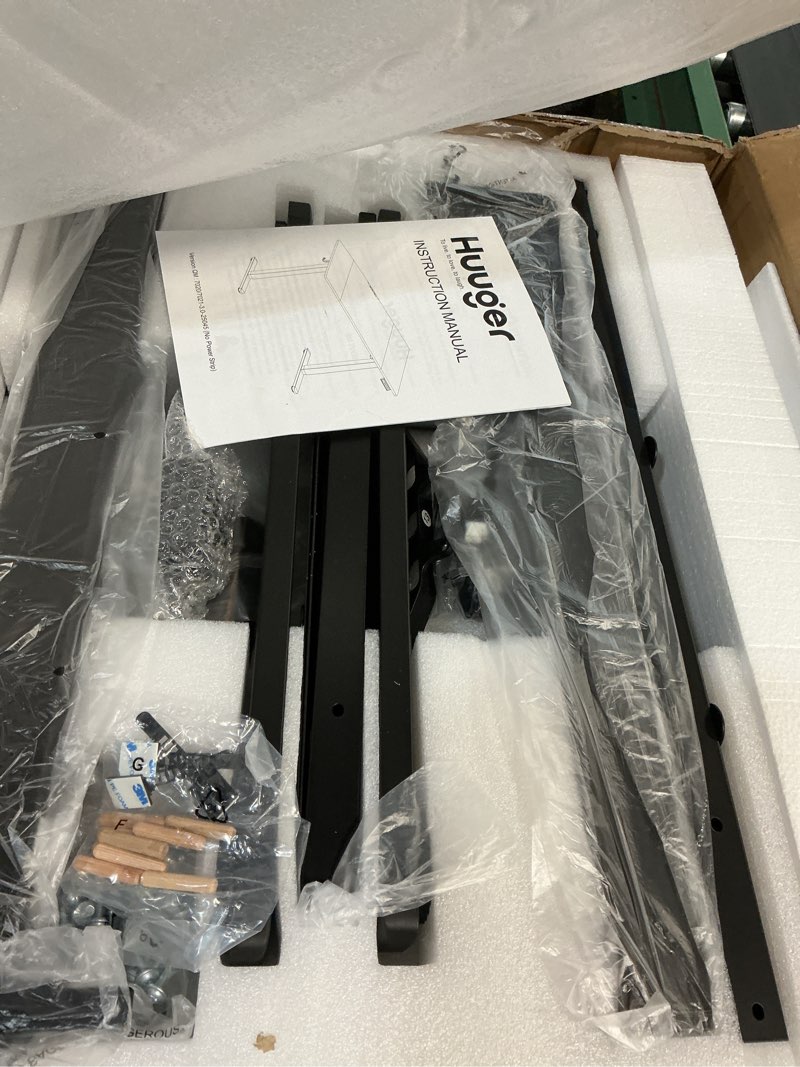 Condition photo showing New/Like New for Huuger 55 x 28 Large Electric Standing Desk, Height Adjustable Computer Desk, 27.6" Deep Desktop, Stand up Gaming Office Table with 2 Hooks, 3 Preset Heights, for Home Office, Black 55*28 inch (no outlets) Black