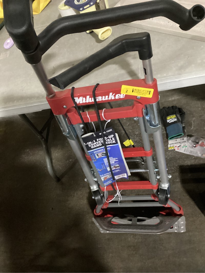 Condition photo showing As Is for milwaukee hand trucks 73333 fold-up convertible hand truck, 4-piece frame, compact storage, 300 lb capacity, red 1