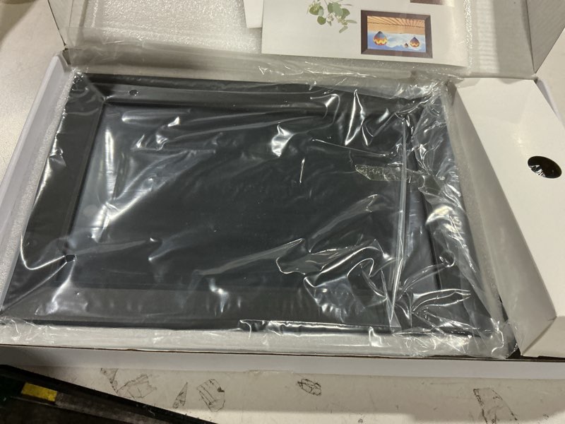 Condition photo showing Good Condition for Frameo 10.1 Inch WiFi Digital Picture Frame with 32GB Memory, 1280 x 800 IPS Touch Screen Smart Electronic Photo Frame, Wall Mountable, Auto-Rotate, Share Photos/Videos Via Frameo App from Anywhere 10.1 inch Black
