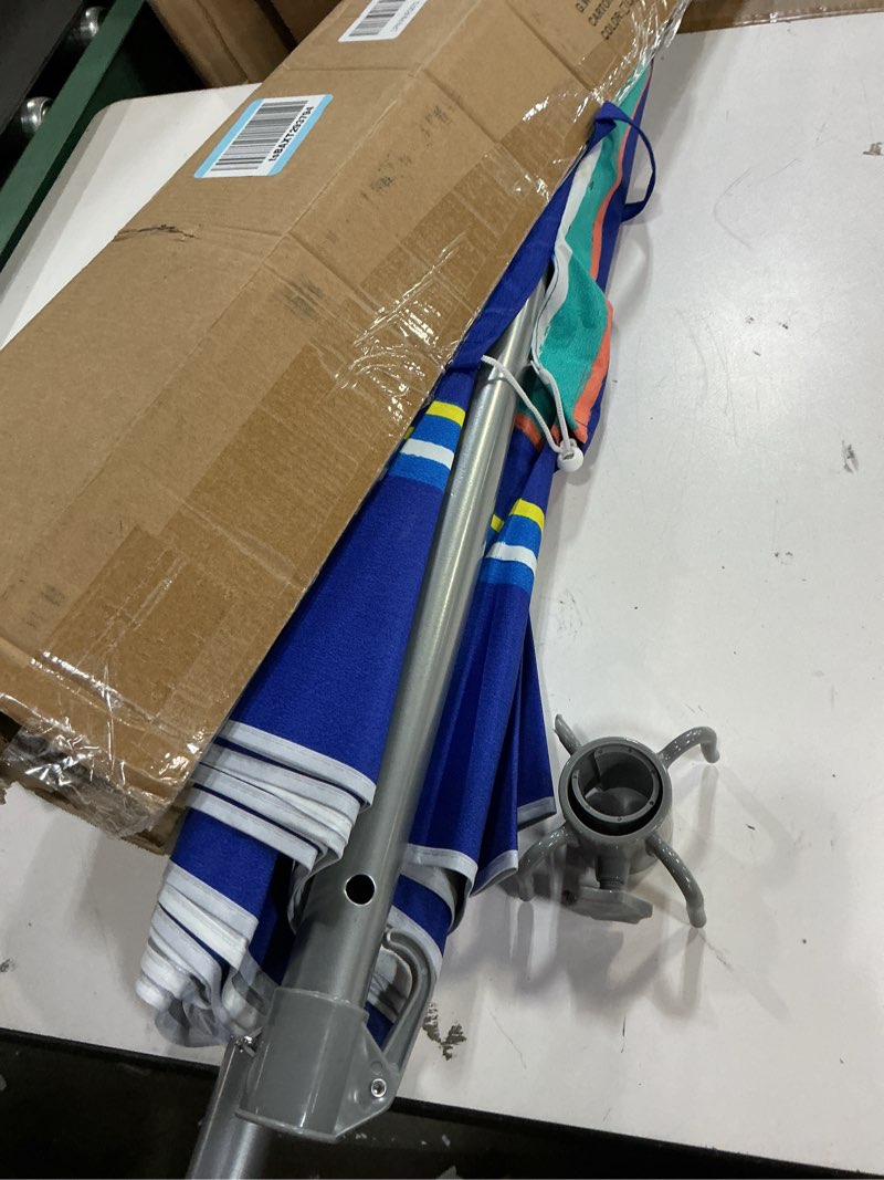 Condition photo showing Good Condition for PASAMIC 7ft Beach Umbrella for Sand Featuring a 23'' Built-in Table with Sand Anchor & Tilt, UPF 50+ Protection Beach Umbrella for Heavy Duty Wind with Bag and Hook, Dark Blue Stripes?Random pattern? Dark Blue Stripes 7FT with Table