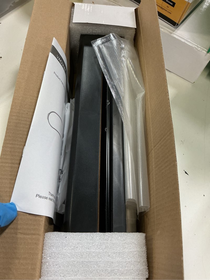 Condition photo showing As Is for 75kpa vacuum sealer machine, compact vacuum sealer for food, 4-in-1 food sealer, digital timer, moist/dry, pulse, seal modes, with 20 vacuum bags, black dark