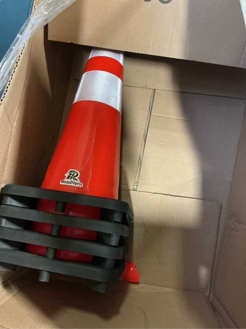 Condition photo showing As Is for RoadHero 4 Pack 28 Inch 5.5 Lb Traffic Cones with Heavy Black Base, Orange Safety Cone with Reflective Collar for Parking Lot, Construction Work, Road Safety 28 Inch Orange 4