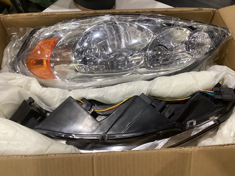 Condition photo showing As Is for as headlight assembly compatible with 2006 2007 2008 2009 2010 2011 2012 2013 chevy impala 2006 2007 chevy monte carlo headlights chrome housing amber reflector driver and passenger side pair