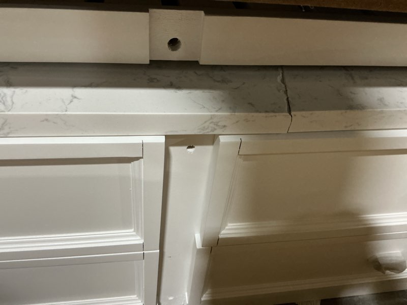 Condition photo showing As Is for ed ellen degeneres riven 24-in w x 28-in h x 10.5-in d white bathroom wall cabinet