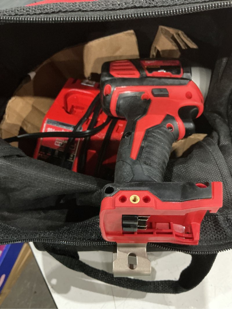 Condition photo showing As Is for (incomplete, missing batteries)impact driver: 1,700 in-lb max. torque, 3,600 rpm no load speed, 4,900 ipm impacts per minute, m18™