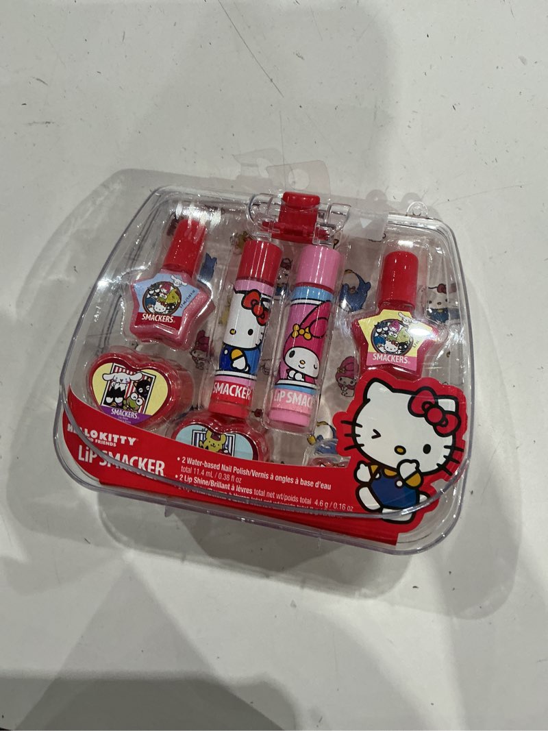 Condition photo showing Good Condition for lip smackers hello kitty makeup tote - 7ct