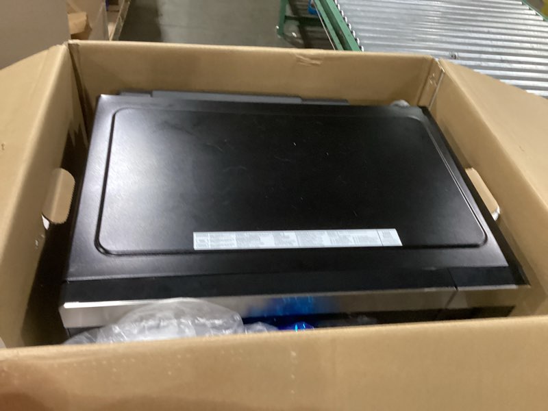 Condition photo showing New/Like New for GE GCST10A1WSS 1.0 Cu Ft Convection Microwave Oven, 1050W Countertop Air Fry Microwave with Broil & Crisper Pan, Compact Stainless Steel Design