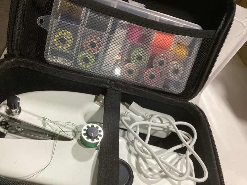 Condition photo showing Good Condition for Unique sewing experience: Handheld sewing machine with storage box, portable package,mini sewing machine for travel, including various accessories and tools White