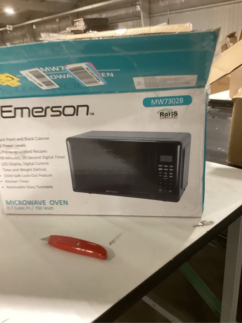 Condition photo showing New/Like New for Emerson MW7302B Compact Countertop Microwave Oven with Touch Control, LED Display, 700W, 10 Power Le