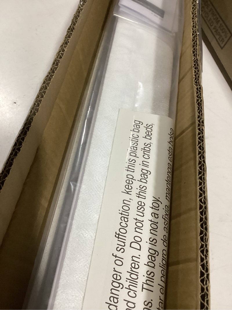 Condition photo showing Good Condition for LazBlinds Cordless Roman Shades for Windows, Light Filtering Thermal Insulated Window Blinds, Lightweight Fabric Blinds for Indoor Windows, 32" W x 60" H, White Light Filtering - White 32" W x 60" H