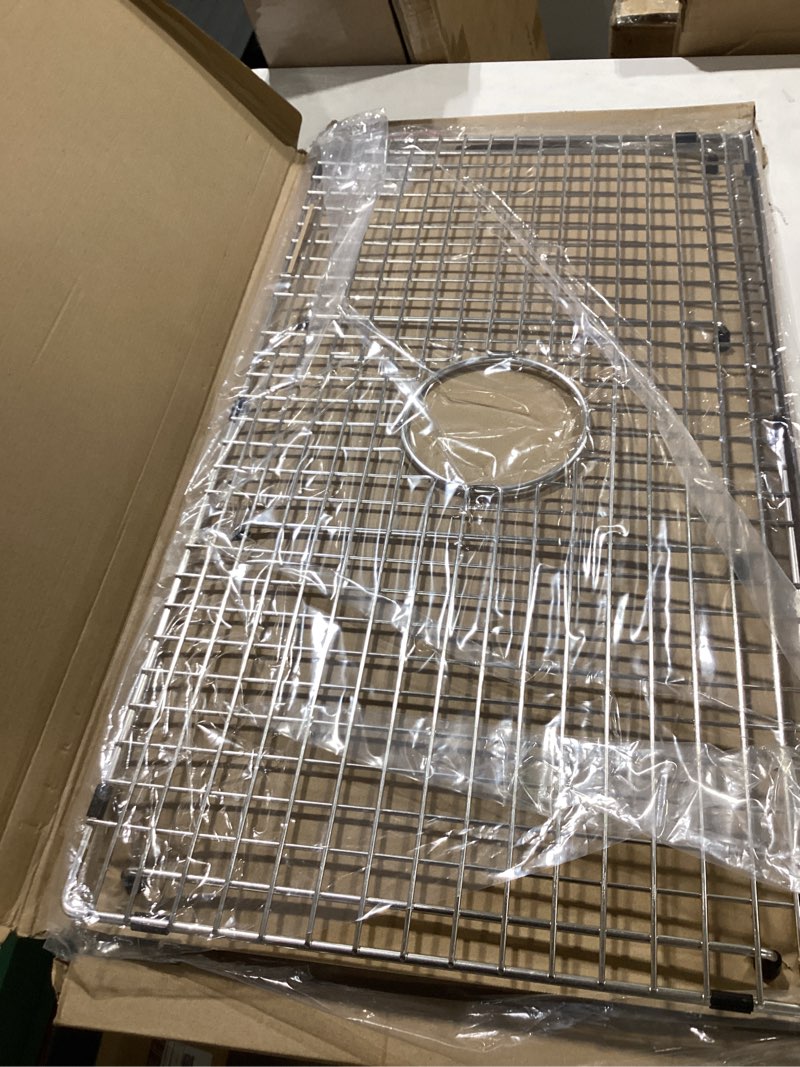 Condition photo showing New/Like New for serene valley sink bottom grid 29-1/2" x 15-9/16", centered drain with corner radius 3/8", sink protector ndg3016c