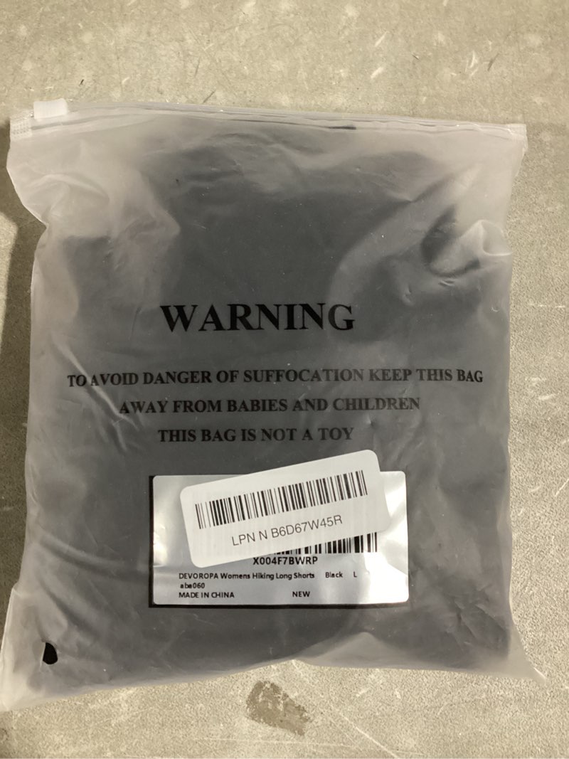 Condition photo showing New/Like New for DEVOROPA Women's Hiking Long Shorts Knee Length Lightweight Quick Dry Cargo Athletic Bermuda Beach Shorts with Zipper Pockets Large Black