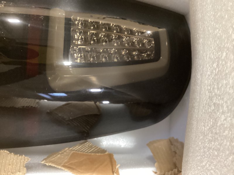 Condition photo showing New/Like New for Full LED Tail Lights for 2009-2018 Dodge Ram 1500/2010-2018 Ram 2500/3500 Rear Light Assembly, Running Lights,Turn Signals, Brake Lights, Reverse Lights, Driver & Passenger Side -Smoked