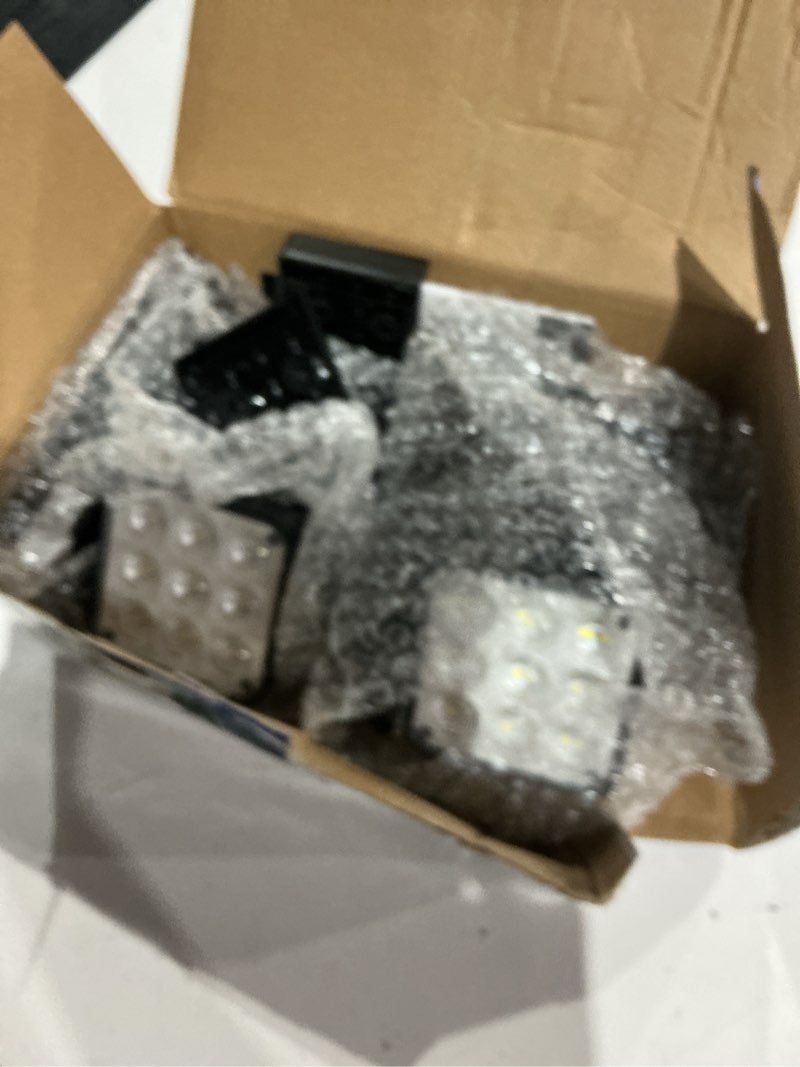 Condition photo showing As Is for wdtpro solar lights outdoor flood light, 3500lm bright motion sensor outdoor lights, 3 heads & upgrade glass panel, led solar powered security light spotlights waterproof for outside yard-2pack 2 pack