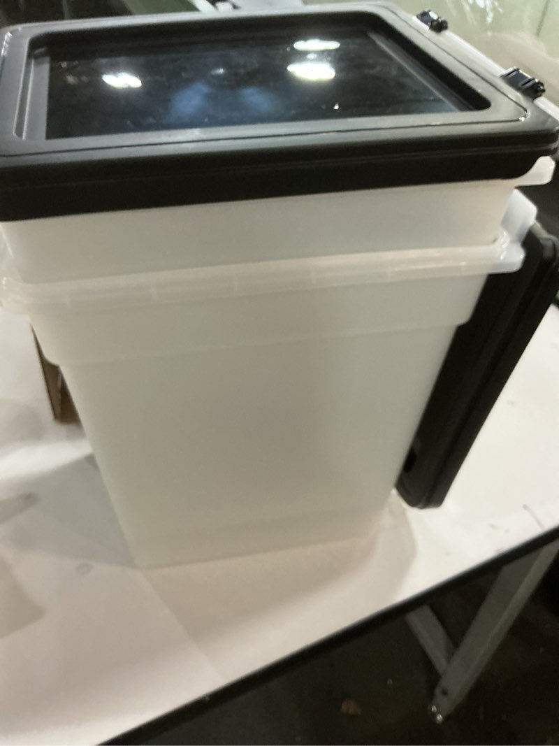 Condition photo showing New/Like New for IRIS USA Airtight Dog Food Storage Container, Up to 10 lbs Each, 2 Pack, for Dog Cat Bird and Other Pet Food Storage Bin, Keep Fresh, Translucent Body, BPA Free, Clear/Black 10 lbs - 2 Pack Clear/Black