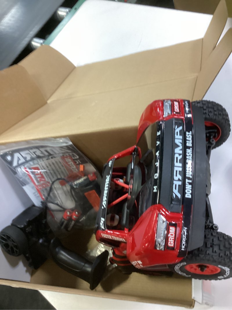 Condition photo showing As Is for ARRMA RC Truck Mojave GROM 4x4 Smart Small Scale Desert Truck, RTR (with Battery and Charger Included) Red/Black ARA2104T1