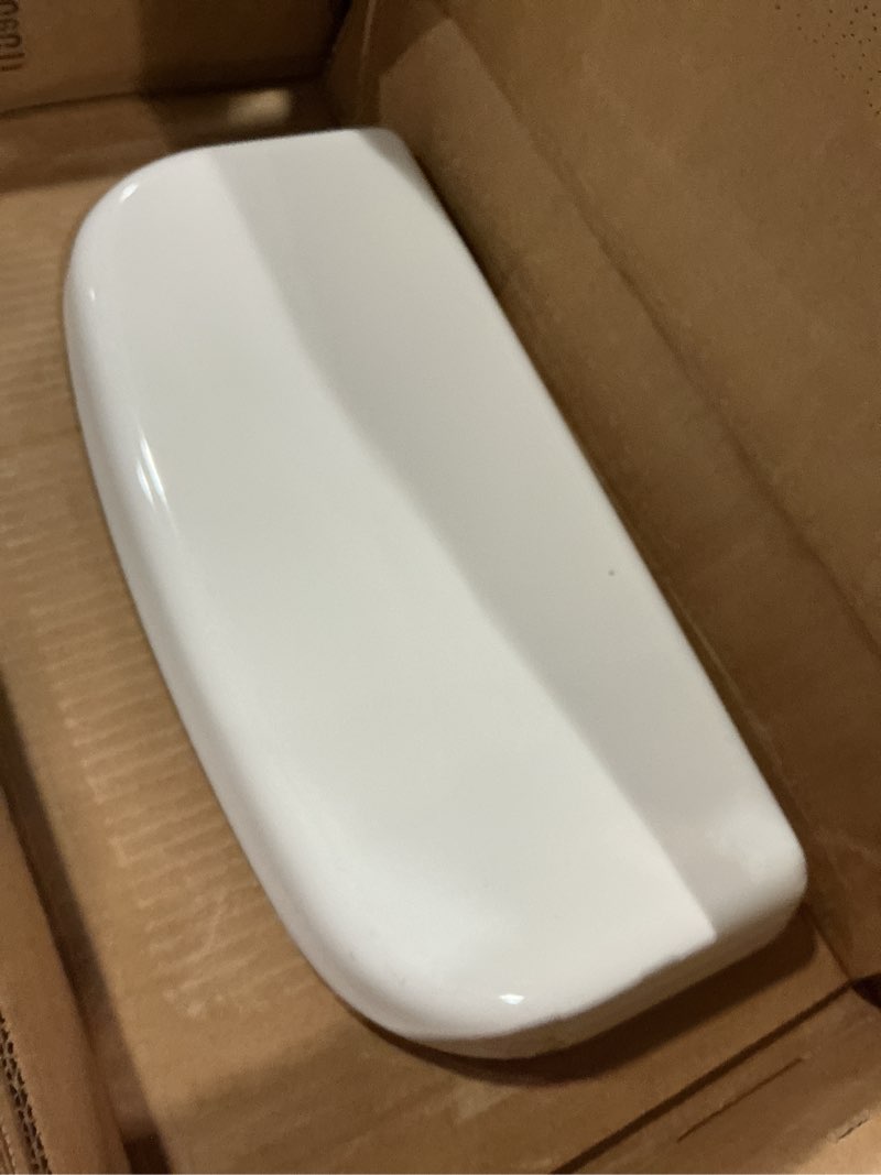 Condition photo showing New/Like New for kohler k-84537-0 toilet tank lid, 16.83"l x 7.75"w, works with kohler toilet tank models: 404515, 404555, 84537, 8721, 8734, and 978734