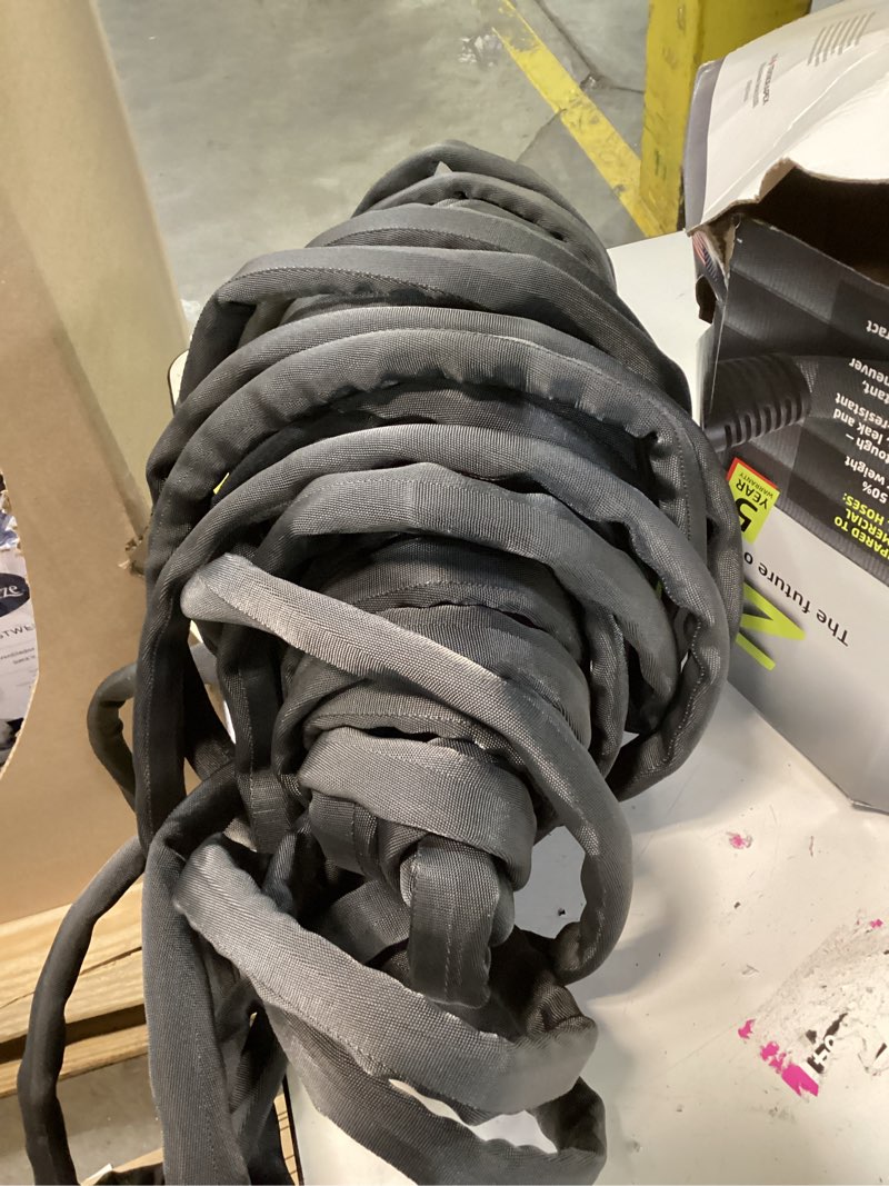 Condition photo showing As Is for zero-g teknor apex 5/8-in x 100-ft premium-duty kink free woven gray hose