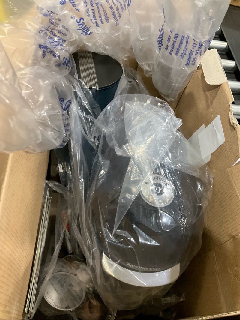 Condition photo showing As Is for NESPRESSO® vertuo plus machine