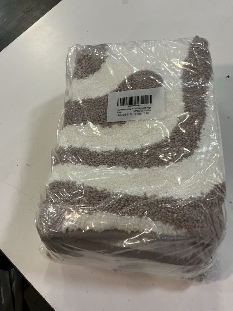 Condition photo showing New/Like New for lumi non slip bathroom rug modern aesthetic, ultra soft absorbent washable bath mats, quick dry premium floor rugs for shower, tub, bathtub, decor, 24x43, drift taupe corrugation - drift taupe 24"x43"