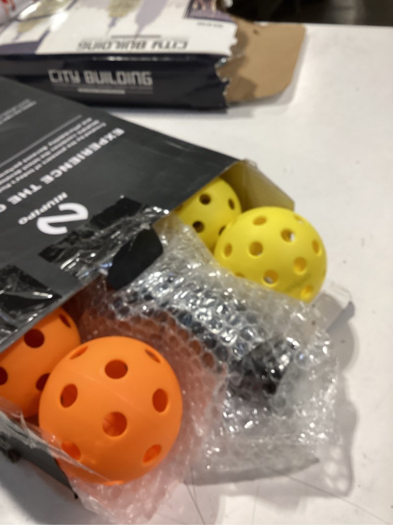 Condition photo showing Good Condition for niupipo Pickleball Paddles Set of 2/4, USAPA Approved Lightweight Pickleball Rackets, Durable Fiberglass Surface with Polypropylene Honeycomb Core, Cushion Grip and Carry Bag ?B. Black and Gray