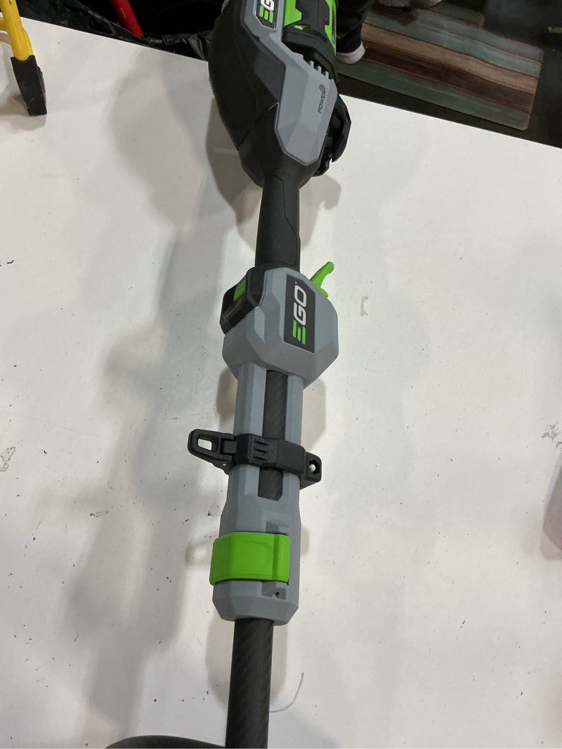 Condition photo showing As Is for ego 56-volt 15-in split shaft attachment capable battery string trimmer 5 ah (battery included) (charger included)