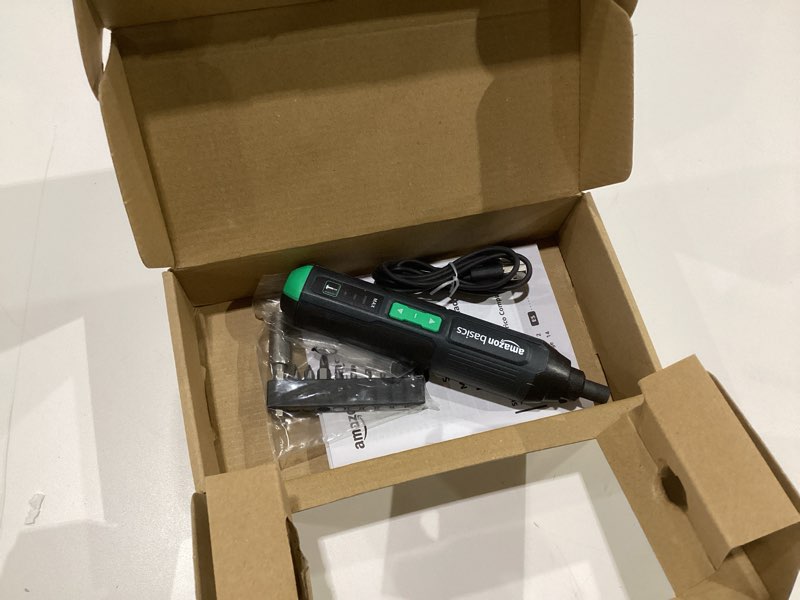 Condition photo showing As Is for Amazon Basics by SKIL 4V Cordless Stick Screwdriver with 10-Piece Bit Set and USB Cable Screwdriver, 10PC Bit Set, NOT TESTED