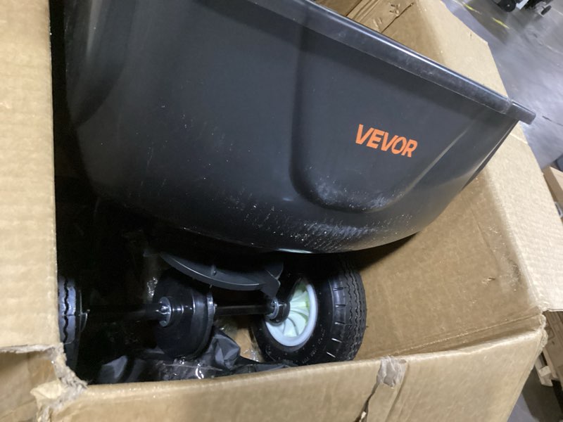 Condition photo showing Good Condition for vevor tow behind broadcast spreader, 130lbs capacity, tow/push garden spreader with 13 in tires, 30 adjustable setting & 9.8 ft spreading width, lawn spreaders for seed, fertilizer, salt, ice melt tow behind 130lb white hubs + black components