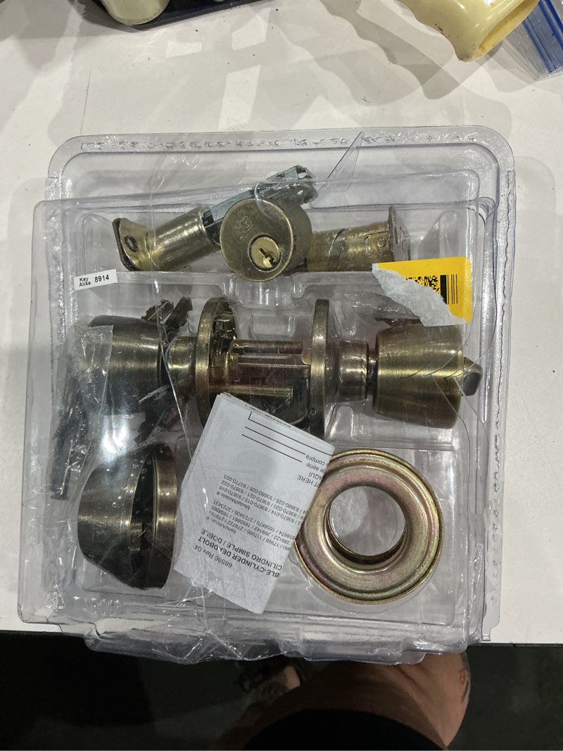 Condition photo showing As Is for reliabilt gallo antique brass exterior single-cylinder deadbolt keyed entry door knob combo pack
