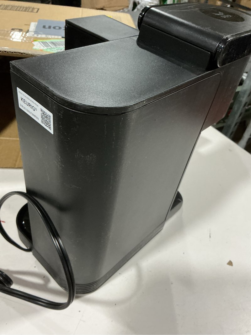 Condition photo showing As Is for keurig k-express single serve k-cup pod coffee maker, 3 brew sizes, strong button feature, 42oz removable reservoir, black