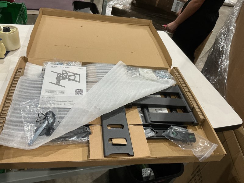 Condition photo showing Good Condition for montek 1.1" ultra slim tv wall mount for 37-75 inch tvs, 132lbs heavy duty, 4x weight tested, full motion articulating bracket, max vesa 400x400mm, fits 16/18" studs 37"-75" low profile