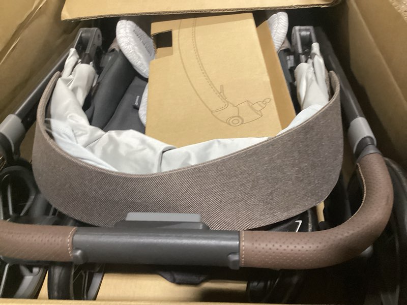 Condition photo showing As Is for UPPAbaby Cruz V3 Stroller - from Birth + Car Seat Compatible - Full-Size, Reversible Seat - Infant Insert, Bug and Rain Shields Included - Owen (Mocha Mélange/Carbon Frame/Chestnut Leather) Owen (Mocha Mélange)