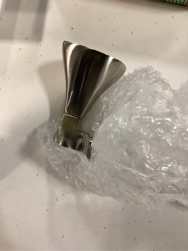 Condition photo showing Good Condition for delta sandover spotshield brushed nickel wall mount pivot toilet paper holder