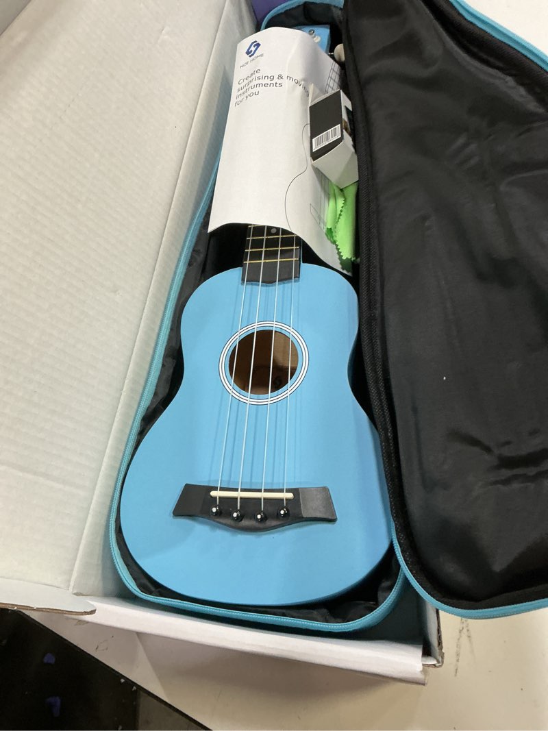 Condition photo showing Good Condition for Soprano Ukulele Beginner Pack, 21 Inch Basswood kids Ukuleles Starter Kit with Gig Bag Digital Tuner Spare Strings and Picks. (blue)
