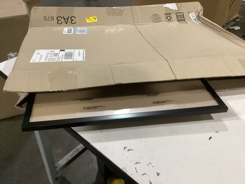 Condition photo showing As Is for HUKONHEP 18x20 Black Picture Frames, Photos Frame with Plexiglass, Wall Gallery Photo Frames, Horizontal and Vertical for Wall Mounting, Home Office Decoration 18"x20"