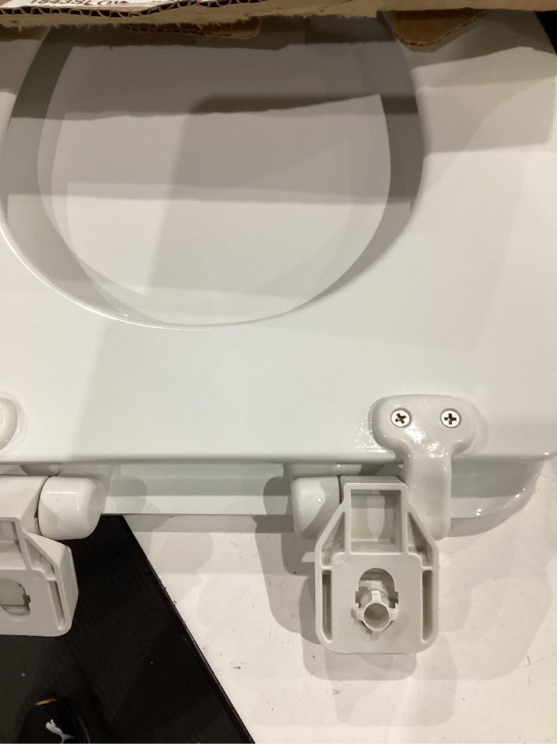 Condition photo showing Good Condition for mayfair linden slow close toilet seat, non slip heavy duty wood, easy install, elongated, white elongated traditional hinge