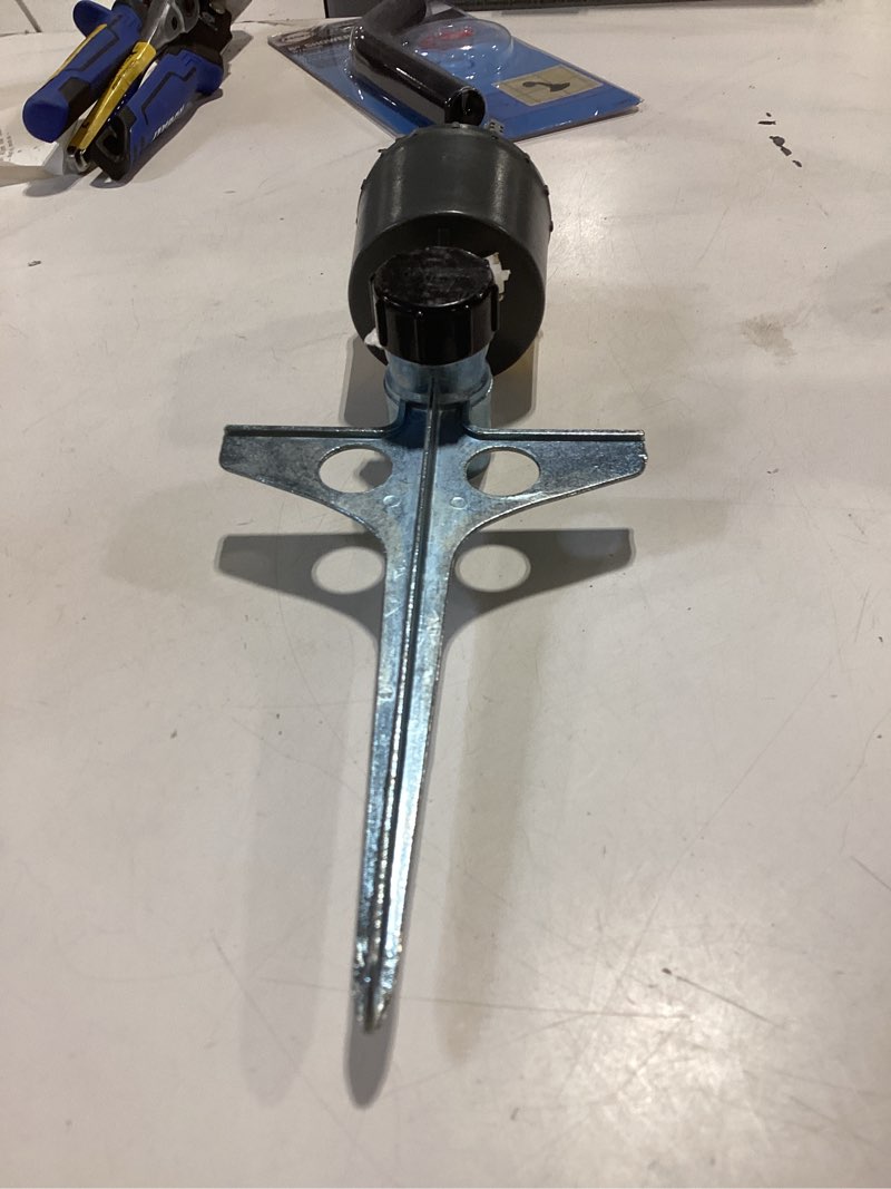 Condition photo showing As Is for orbit 5000-sq ft rotating spike lawn sprinkler