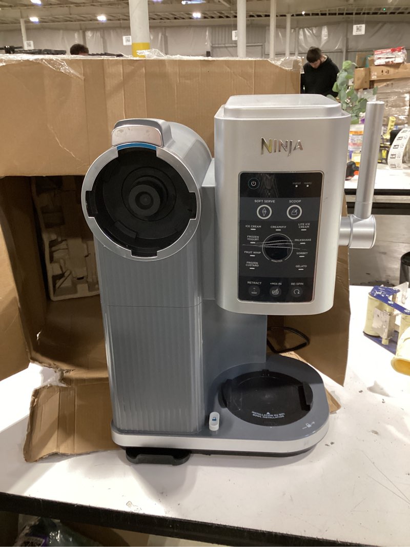 Condition photo showing As Is for ninja creami scoop & swirl ice cream maker, soft serve desserts, sorbet, milkshakes, frozen yogurt and more, 13-in-1 programs, includes handle and two 16 oz 2-in-1 pints, nc701 creami swirl