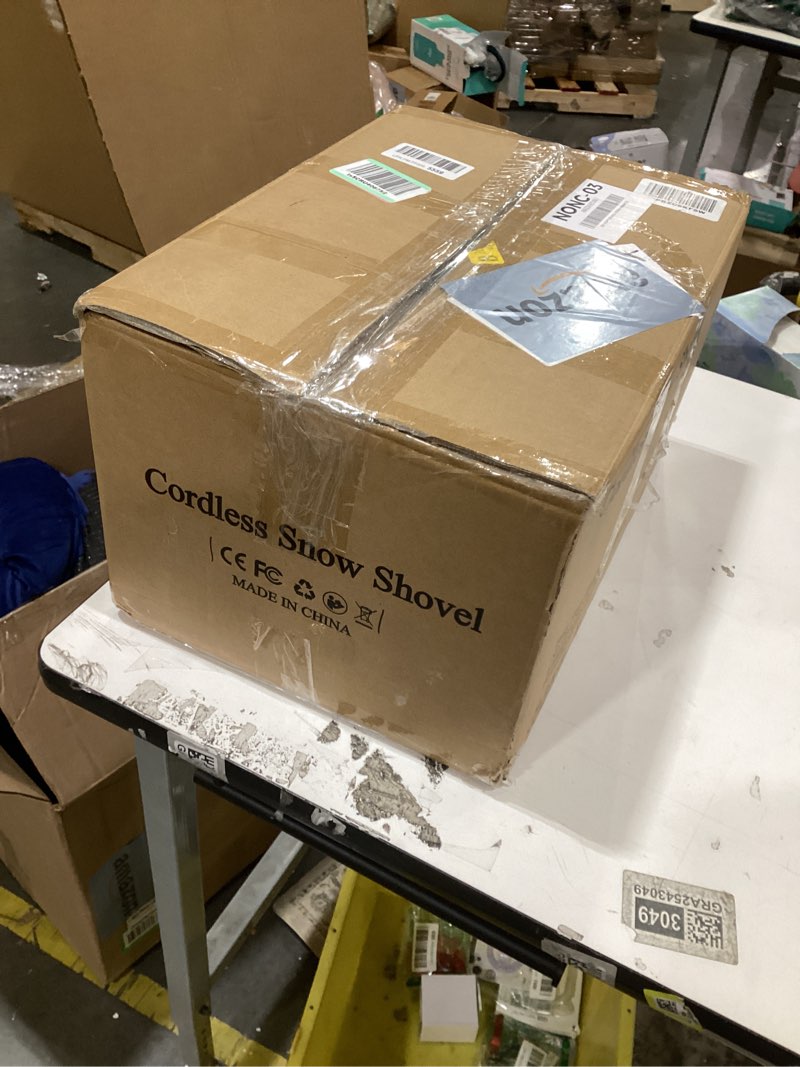 Condition photo showing As Is for Cordless snow shovel