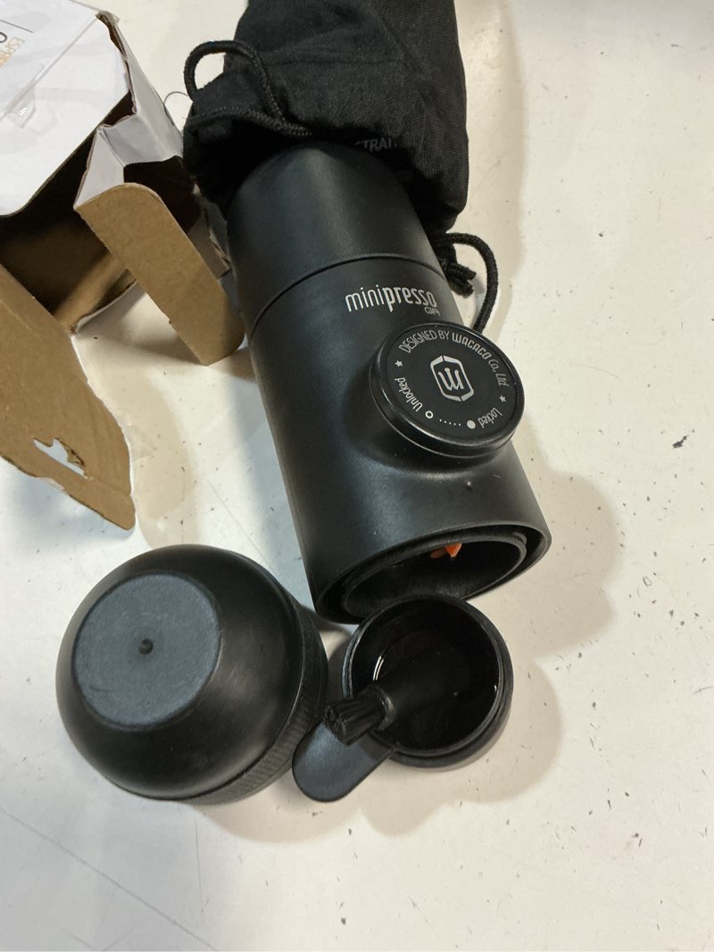 Condition photo showing As Is for wacaco minipresso gr, portable espresso machine, compatible ground coffee, hand coffee maker, travel gadgets, manually operated, perfect for camping, hiking black