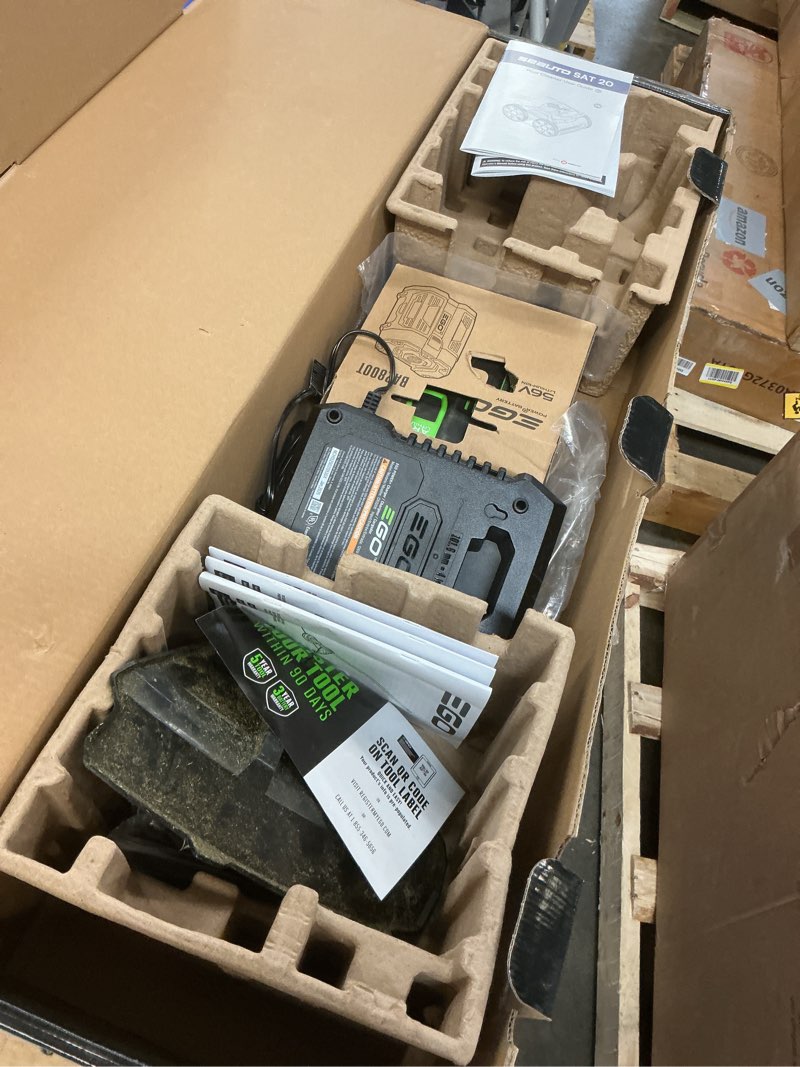 Condition photo showing As Is for ego power+ multi-head system with line iq, powerload 56-volt 17-in straight shaft attachment capable battery string trimmer 5 ah (battery included) (charger included)